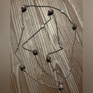 Long pearl and diamond necklace